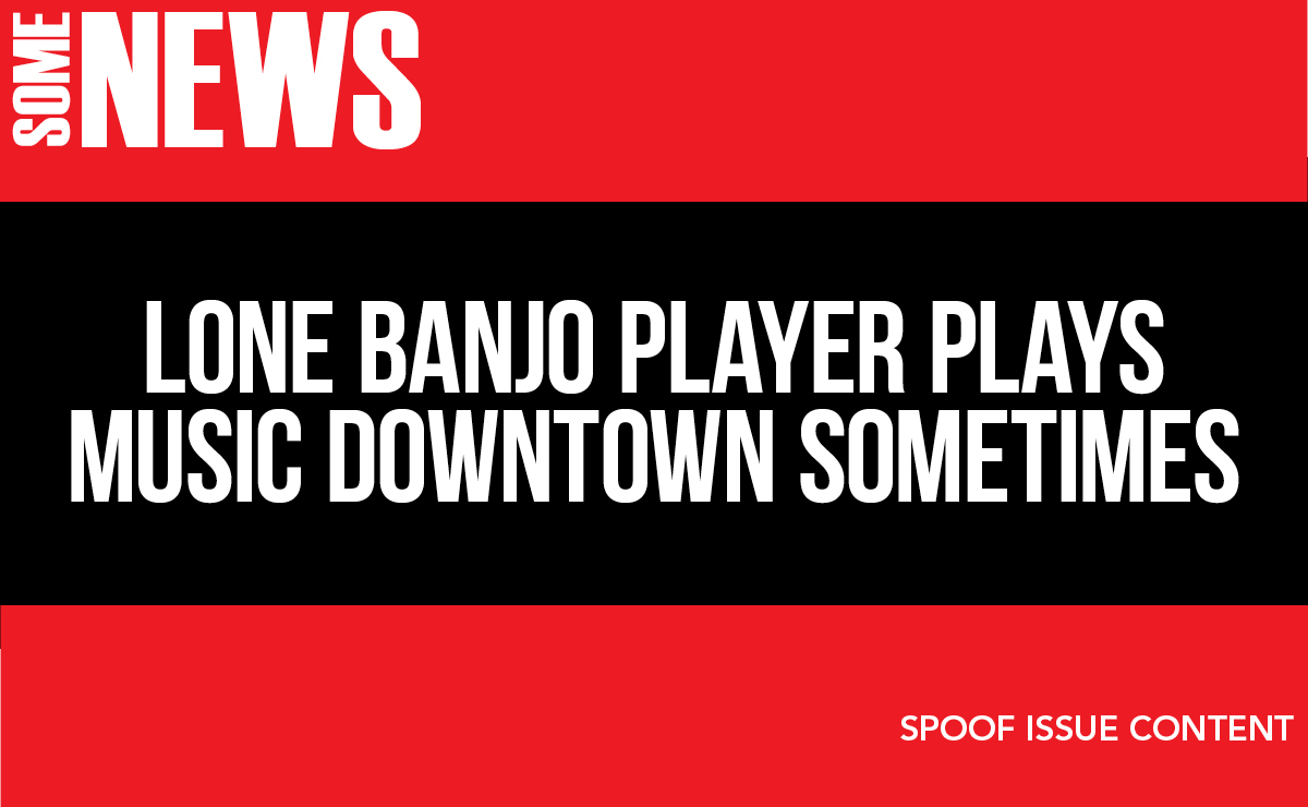 Lone banjo player plays music downtown sometimes
