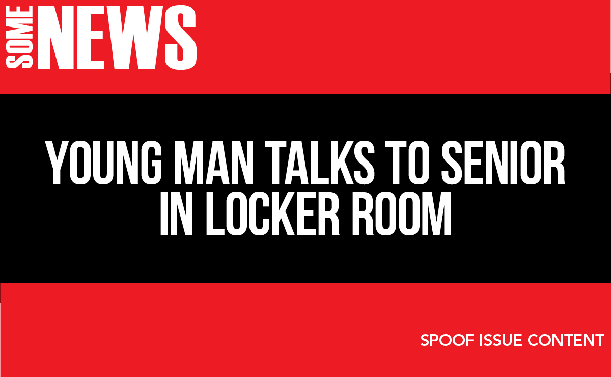 Young man talks to senior in locker room; senior uncomfortable