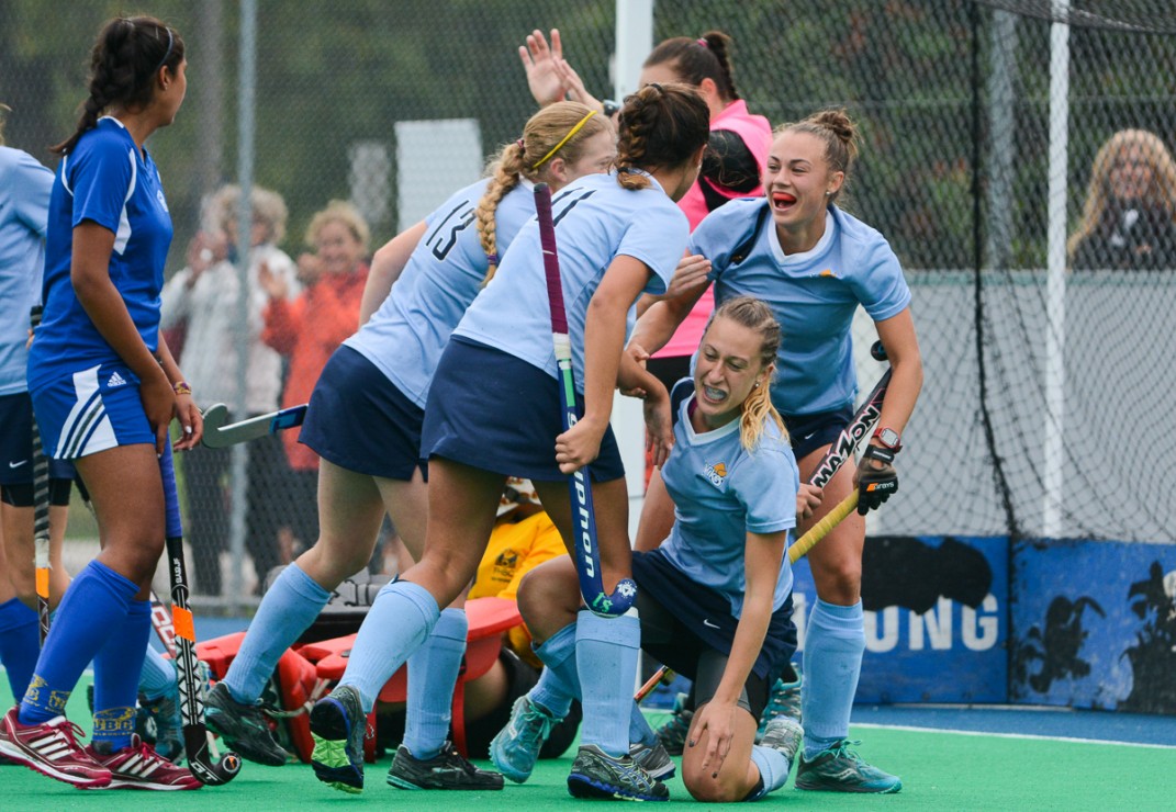 Members of the Vikes women's field hockey team celebrate after a goal against UBC on Oct. 12, 2014. The victory puts the Vikes at the top of the Canada West conference heading into the CIS championship in Toronto later this month. —Hugo Wong (photo)