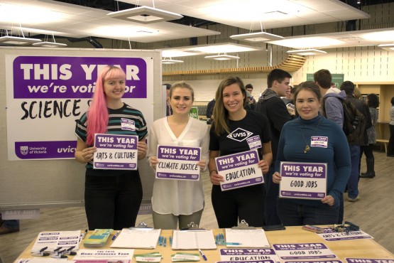 From L to R: Aria Poutanen, Solenn Madevon, Makenzie Zouboules, and Selena Barwin table for the This Year We're Voting campaign. Photo by Sarah Lazin.