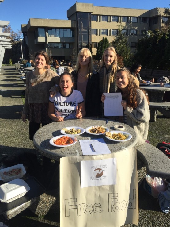 ￼Members of Vulture Culture table outside Mystic Market to encourage students to try tray raiding. Photo provided by Vulture Culture