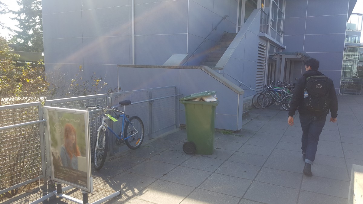One student’s bike (pictured above) can be seen locked up against a railing at the David Turpin building. Attached to the lock is a warning from campus security, threatening impoundment. Photo by Julian Kolsut, Contributing Writer