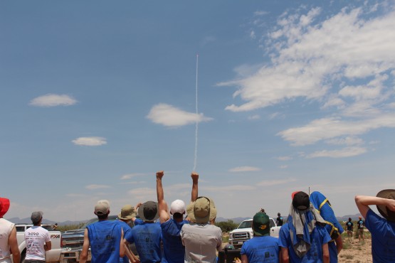 A member of UVic Rocketry celebrates a successful launch. Photo provided