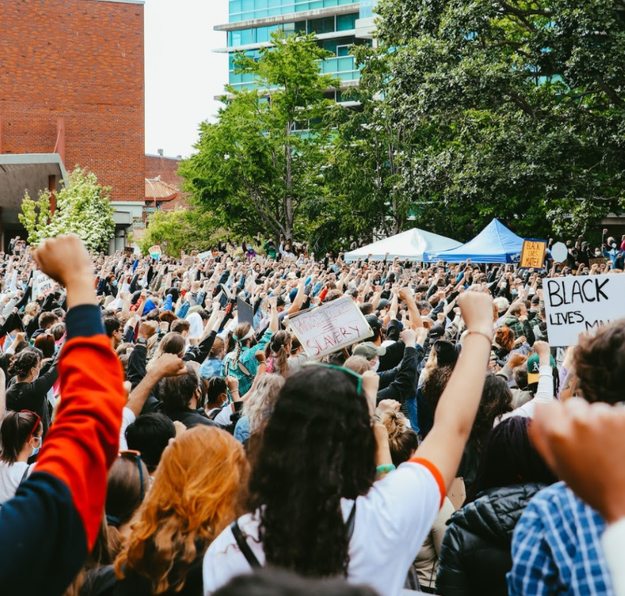 Black Lives Matter peace rally, protestors with fists in the air