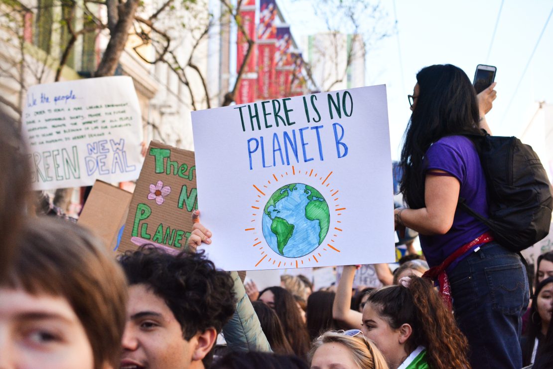 A climate protest sign reading "there is no planet B". Photo by Li-an Lim via Unsplash.