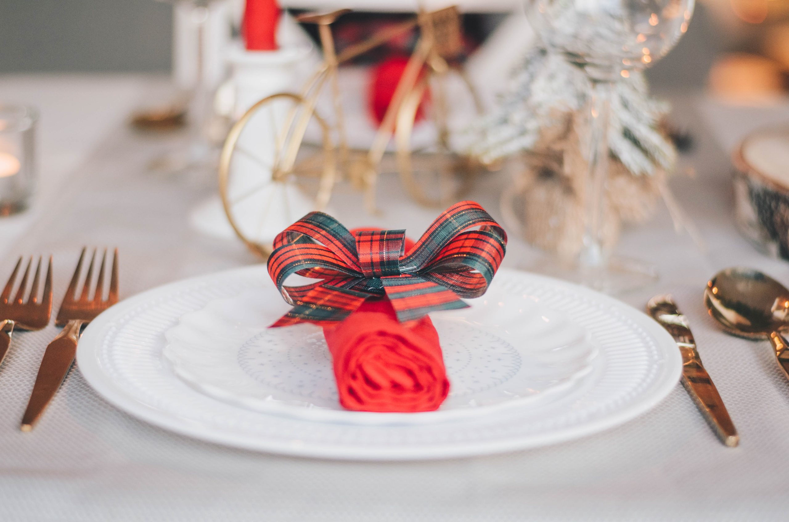 Holiday dinner, photo by Libby Penner via Unsplash.