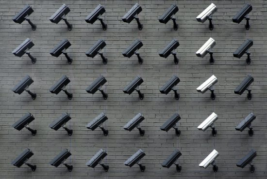 Surveillance cameras, photo by Lianhao Qu via Unsplash.