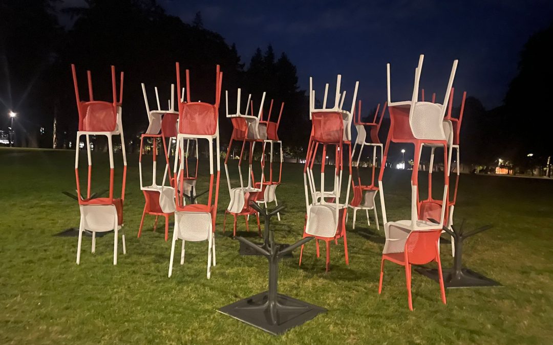 Wondering who’s behind the chair sculptures?