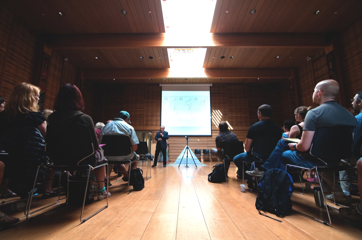 Terry Tobias leads a workshop on Aug. 26 on land use and occupancy studies in the First People's House. –Hugo Wong(photo)