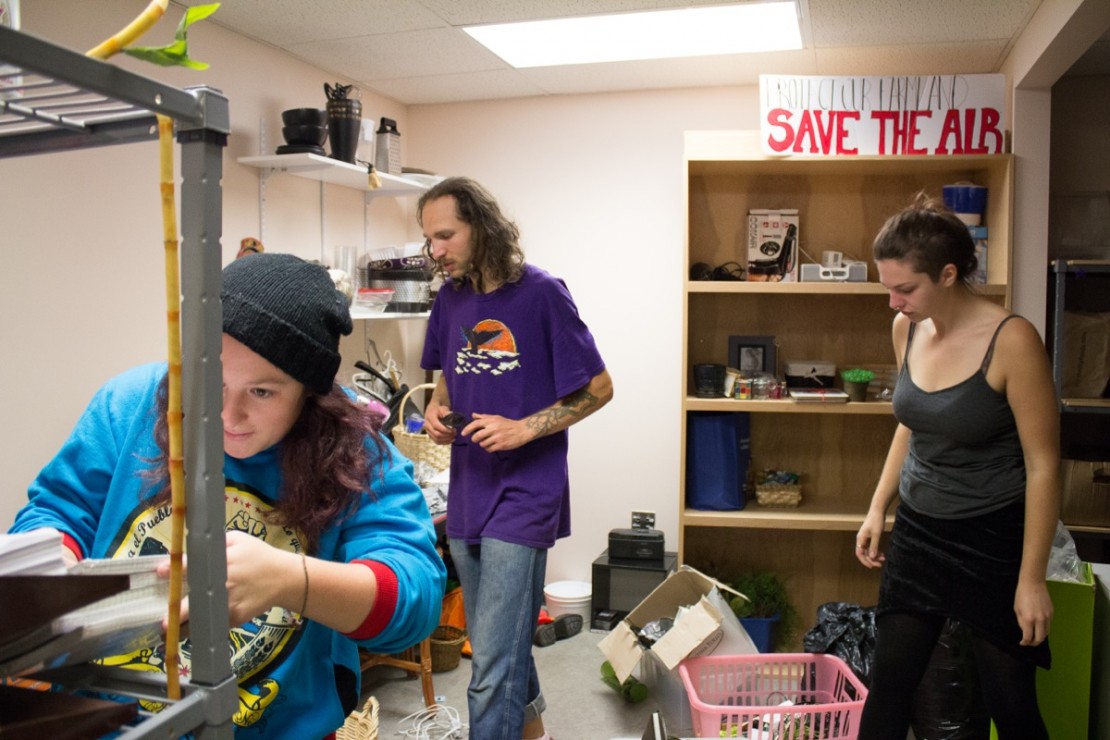 UVSS director-at-large Kenya Rogers organizes the move of the food bank and free store before it opens on Sept. 30. –Hugo Wong (photo)