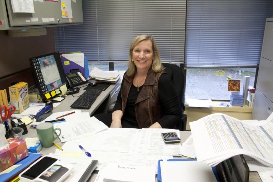 Island Sexual Health Society executive director Bobbi Turner poses in her office. The clinic, in operation for over 45 years, has cut back on staff and advertising to improve its finances after funding cuts. Photo by Sarah Allan (Photo Editor)