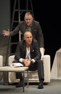 Vincent Gale (top) and Brian Markinson (seated) star in Speed-the-Plow. Photo by David Cooper via the Belfry Theatre.