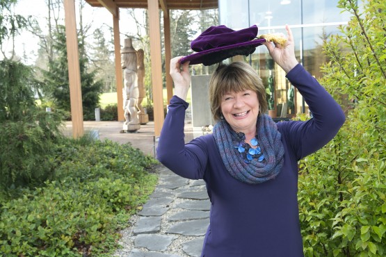 Shelagh Rogers, UVic's Chancellor, admits each and every graduate from the university with a bop of her hat. Photo by UVic Photo Services