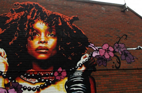 Erykah Badu, represented here by Eva Mena’s street art on a London wall, is one less problematic artist for feminists who like rap music. Photo by Tony Monblat via Flickr