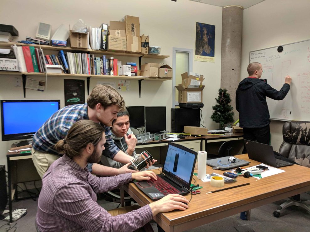 Members of the UVic Satellite club work on their projects. 