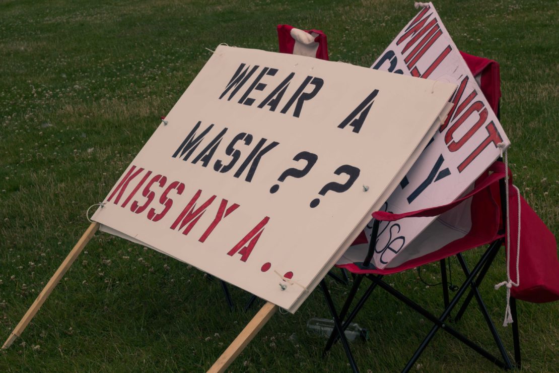 anti-mask protest sign