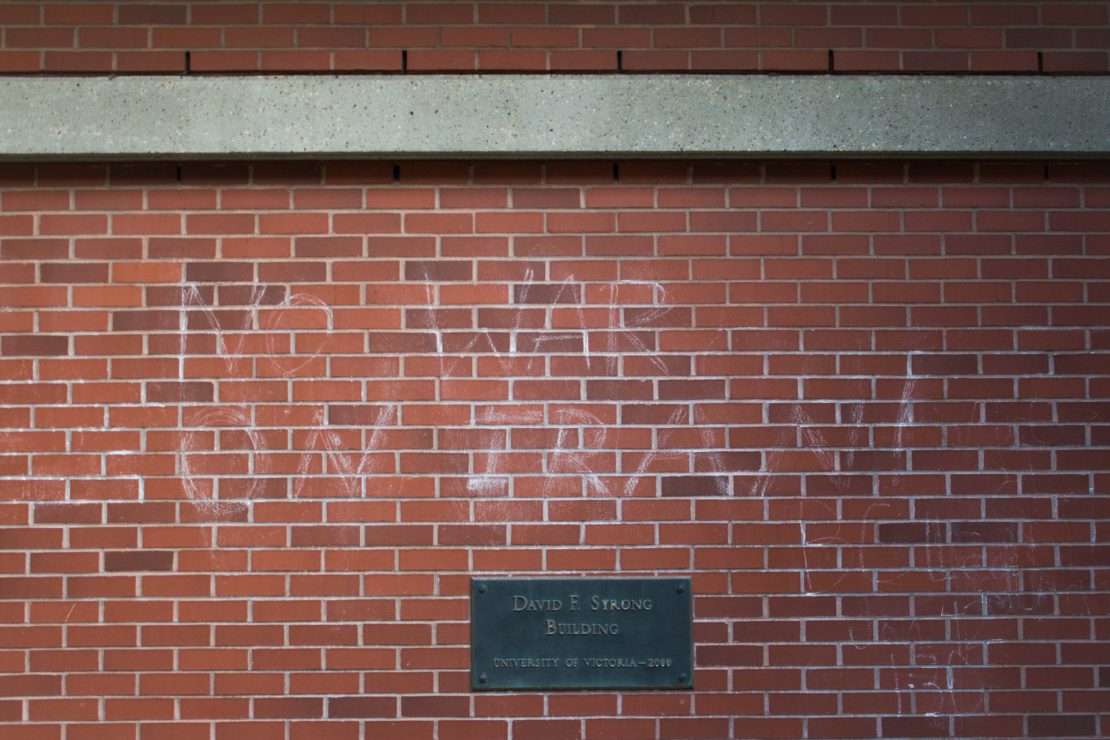 Anti-war messages remain outside the David Strong building from early 2020. UVic Business student Roja Omidbakhsh was killed in a plane crash during heightened Iran-U.S. tensions in January