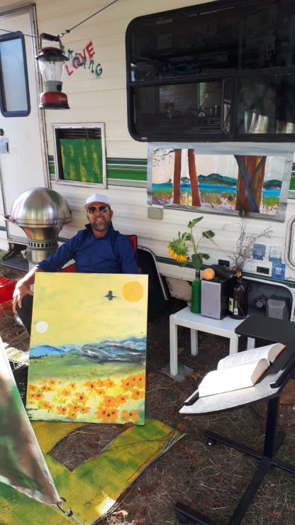 Aki shows off his art in Beacon Hill Park.