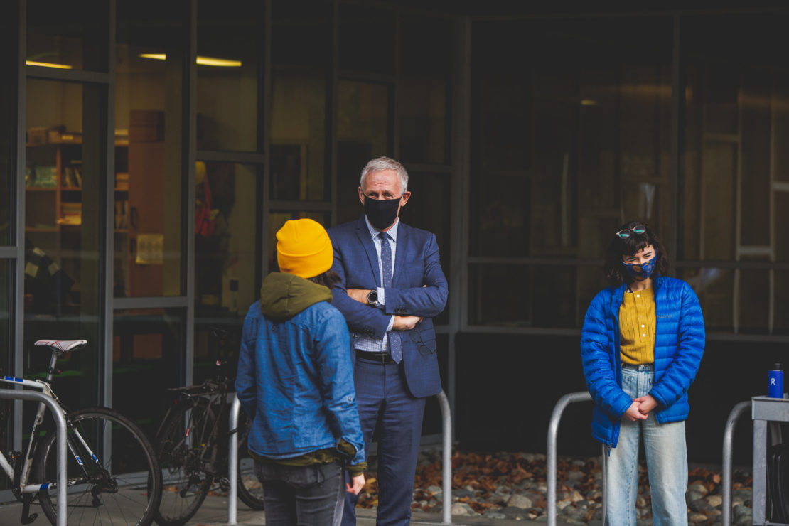 president hall meets with divest uvic mural organizers