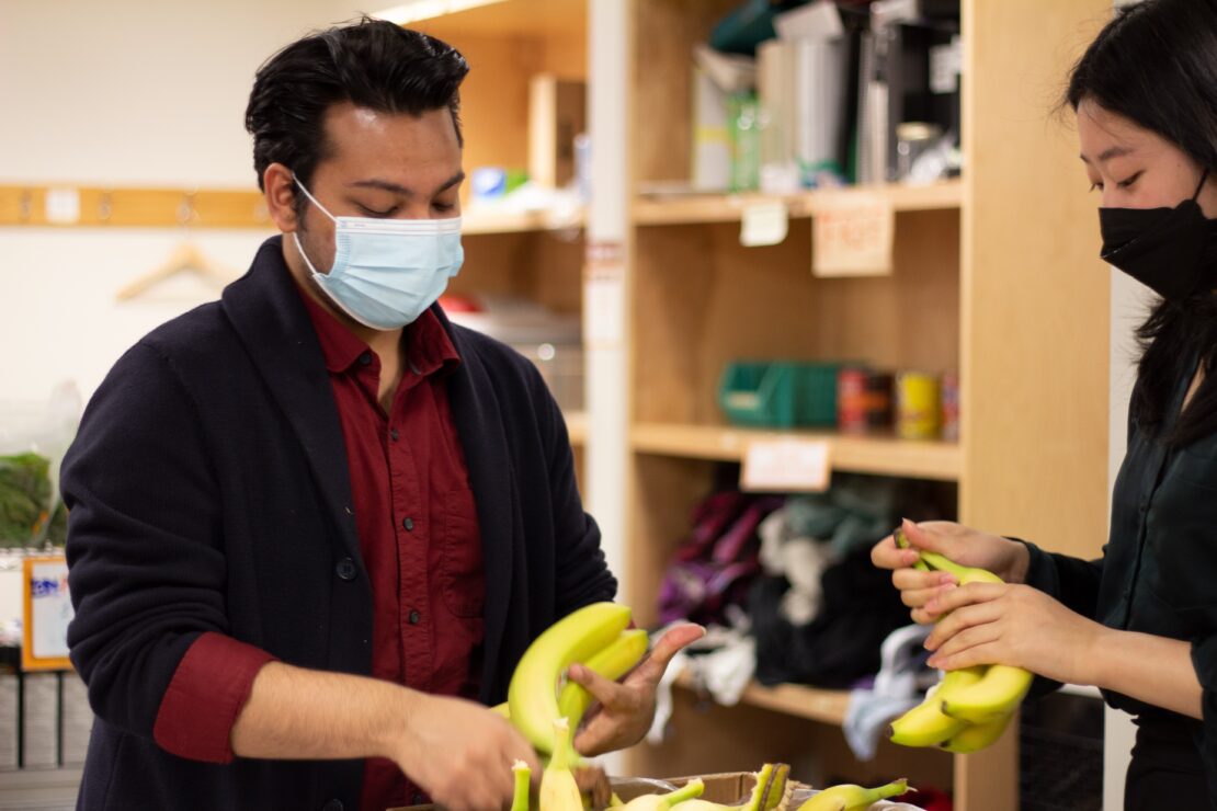 Food Bank Officers preparing bananas for pick up