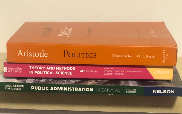 Poli-sci textbooks, photo by Raheem Uz Zaman,