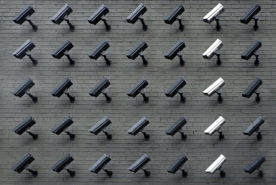 Surveillance cameras, photo by Lianhao Qu via Unsplash.