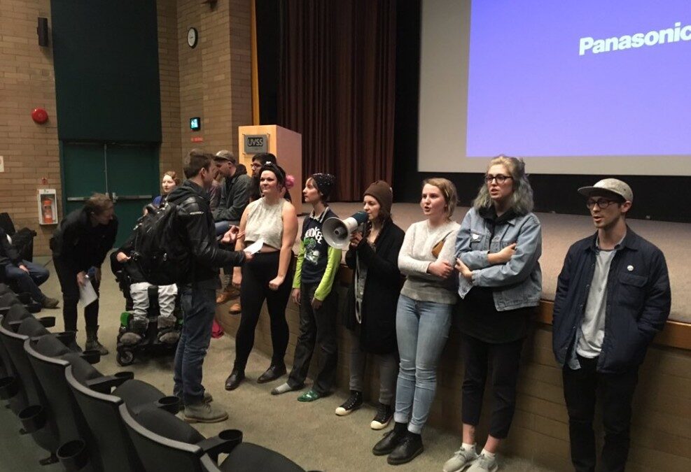 Protesters crash effective altruism debate